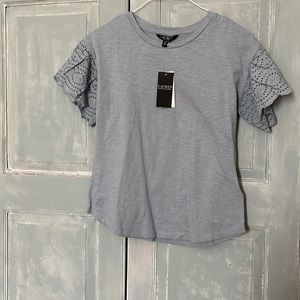 women’s Short Sleeve T-Shirt in size Small in pale blue . Cute ruffled sleeves